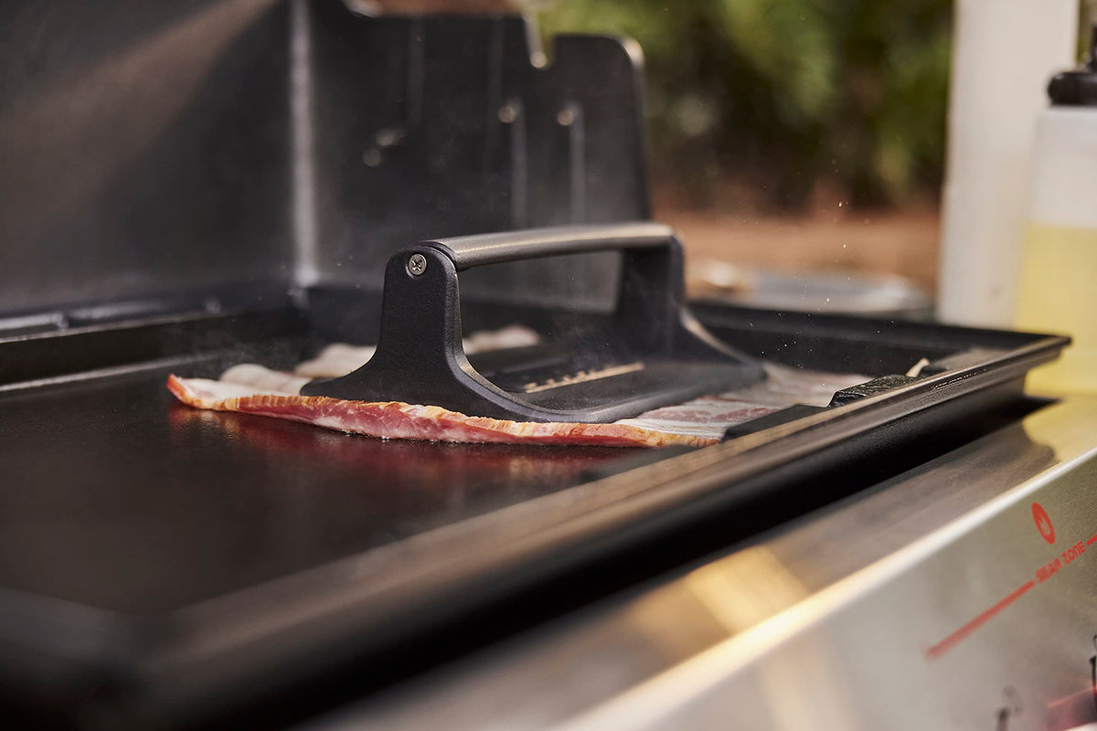 Weber Griddle Press ensures paninis stay compact and crispy.