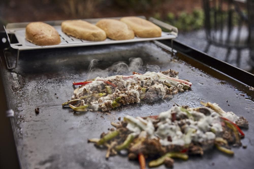 Weber Griddle Warming Rack narrow-slits promote airflow and prevent dripping.