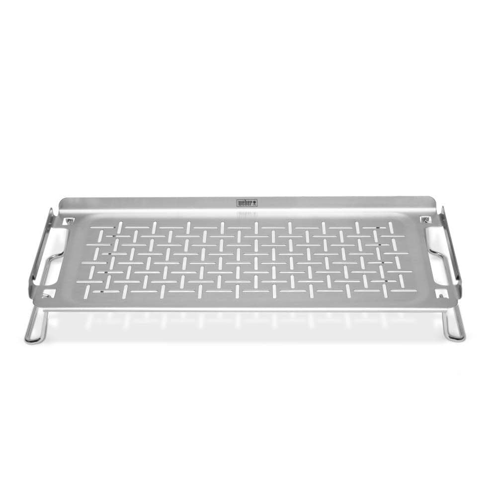 Weber Griddle Warming Rack raised-back-edge eases lifting delicate foods.