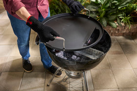 Weber griddle with large-capacity drip pans for batch cooking