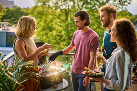 Weber Lumin Compact grill side profile highlighting portability for balconies.