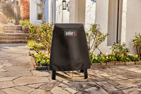 Weber Lumin cover is easy to put on and take off for quick grilling setups.