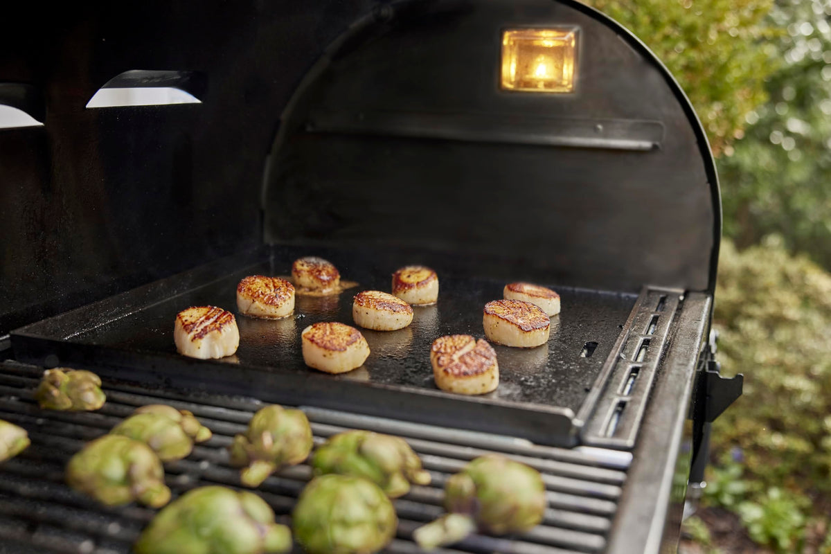 No coatings, metal tools safe on Weber Crafted griddle.