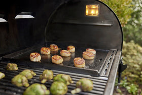 No coatings, metal tools safe on Weber Crafted griddle.