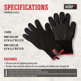 Weber Premium Gloves demonstrate heat resistance for lifting hot grill lids and pans.