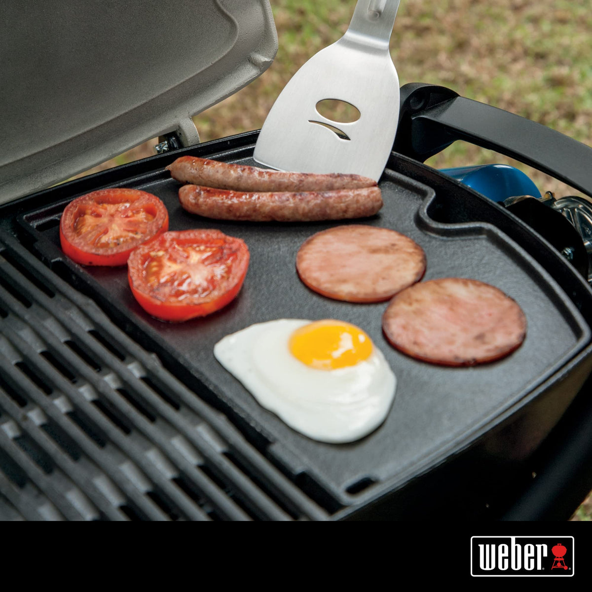 Weber Q Griddle showcases heat retention for consistent searing from pancakes to seafood.