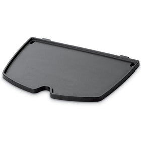 Weber Q Griddle with porcelain-enameled cast iron delivers even heat for breakfast.