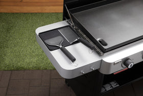 Weber Side Table Tool Rest holds multiple grilling tools within easy reach.