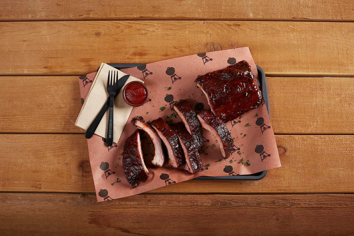 Weber silicone grilling gloves provide firm grip when moving large meats from hot surfaces