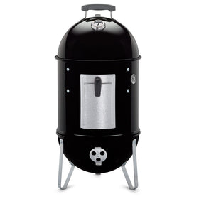 Weber Smokey Mountain 14-inch lid porcelain-enameled for durable heat retention.