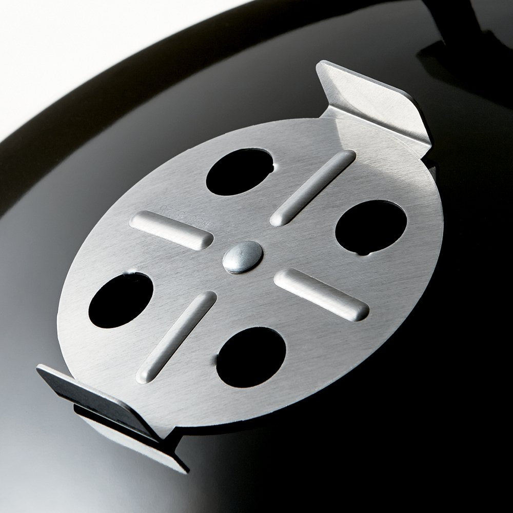 Weber Smokey Mountain built-in thermometer helps monitor internal temperature.