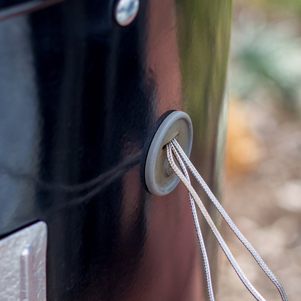 Weber Smokey Mountain lid and bowl vents aid airflow management.