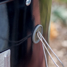 Weber Smokey Mountain lid and bowl vents aid airflow management.