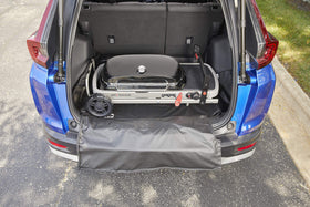 Weber Traveler easy-transport cover helps organize gear and protect the interior