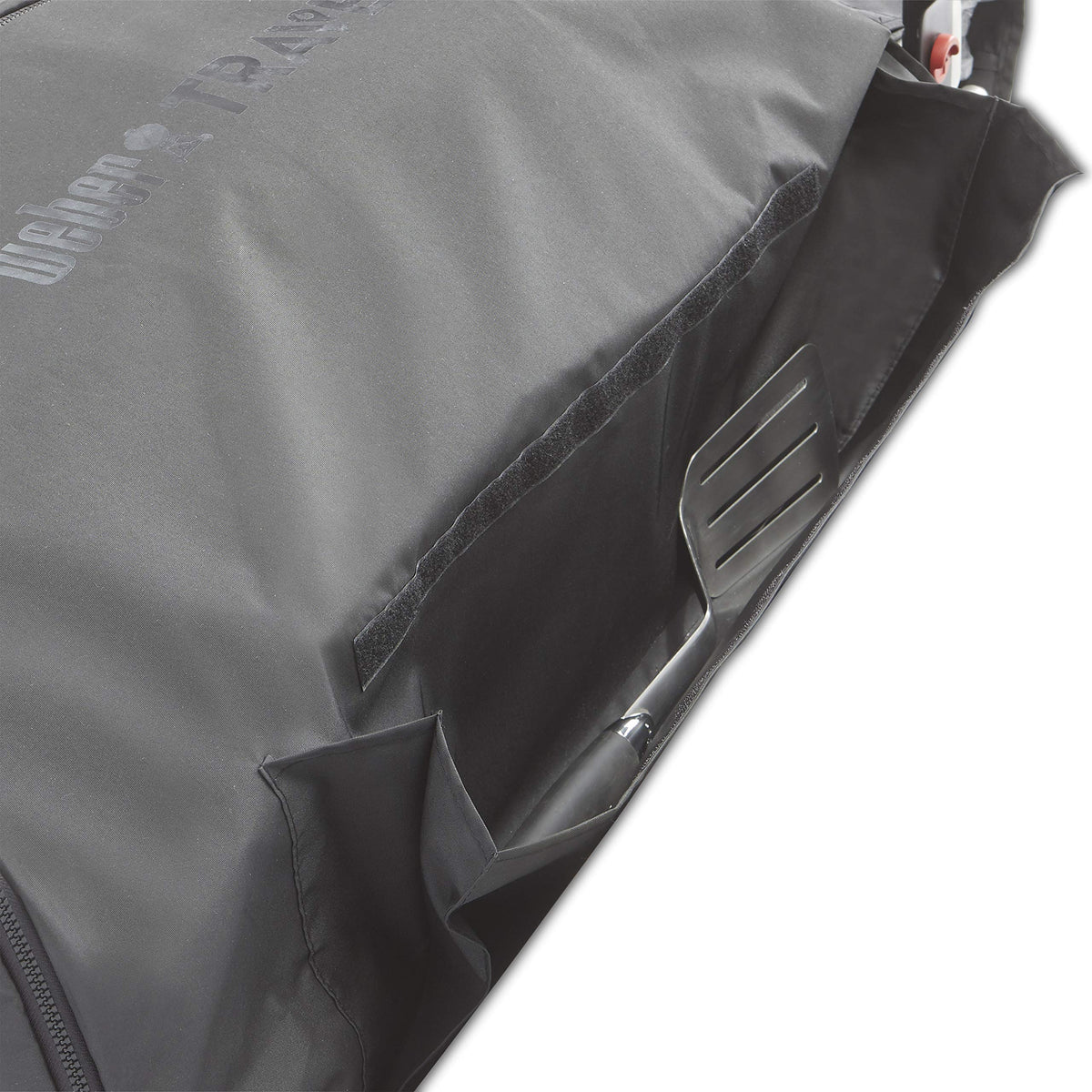 Weber Traveler cover folds flat for compact storage when not in use