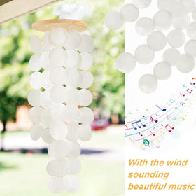 WeDoSoy Capiz wind chimes showing the natural wood top for durable outdoor use