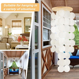 Sunlight passing through WeDoSoy wind chimes creating soft light play