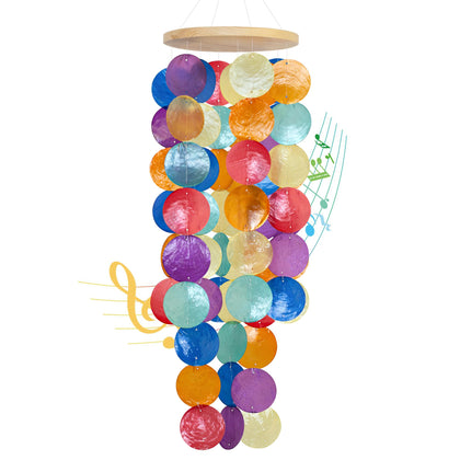 WeDoSoy wind chimes outside with rainbow capiz shells create a gentle coastal ambiance.