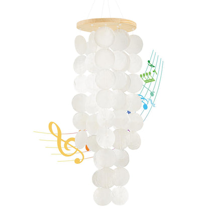 WeDoSoy wind chimes outdoors with Capiz shells shimmering for coastal ambiance
