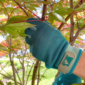Wells Lamont 7754L gloves with padded palm and knuckles for added protection in DIY projects.