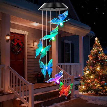 WENANA blue butterfly solar wind chimes glow with color-changing lights at night.