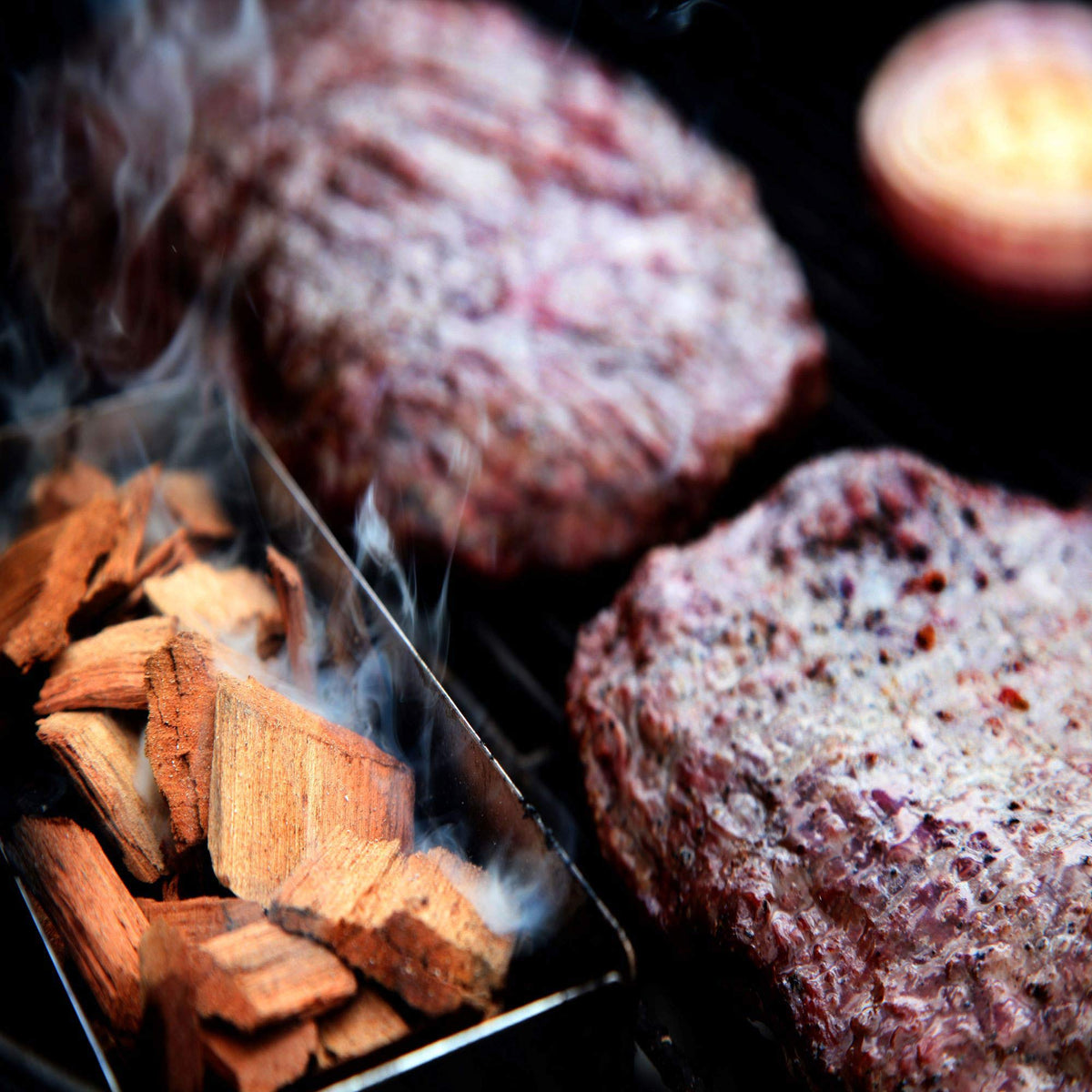 Western Premium Hickory chips in action deliver even smoky flavor for meat.