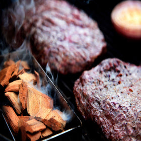 Western Premium Hickory chips in action deliver even smoky flavor for meat.