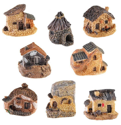 WETEPUXI 8-piece miniature fairy garden houses add charming, durable detail to outdoor beds and terrariums.