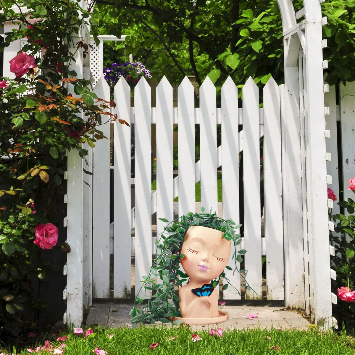 WEWEOW cute lady-face planter with butterfly detail for creative displays.