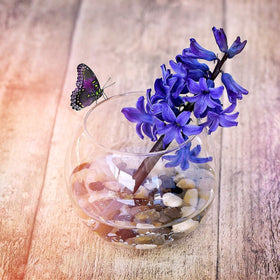 WGVI WGV handcrafted glass vase with bubbles adds character.
