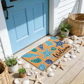 Whaline seashell doormat indoor outdoor versatility for entryways and patios.
