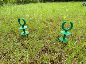 WIBBLESOX stake keeps hose off ground, protecting plants and beds