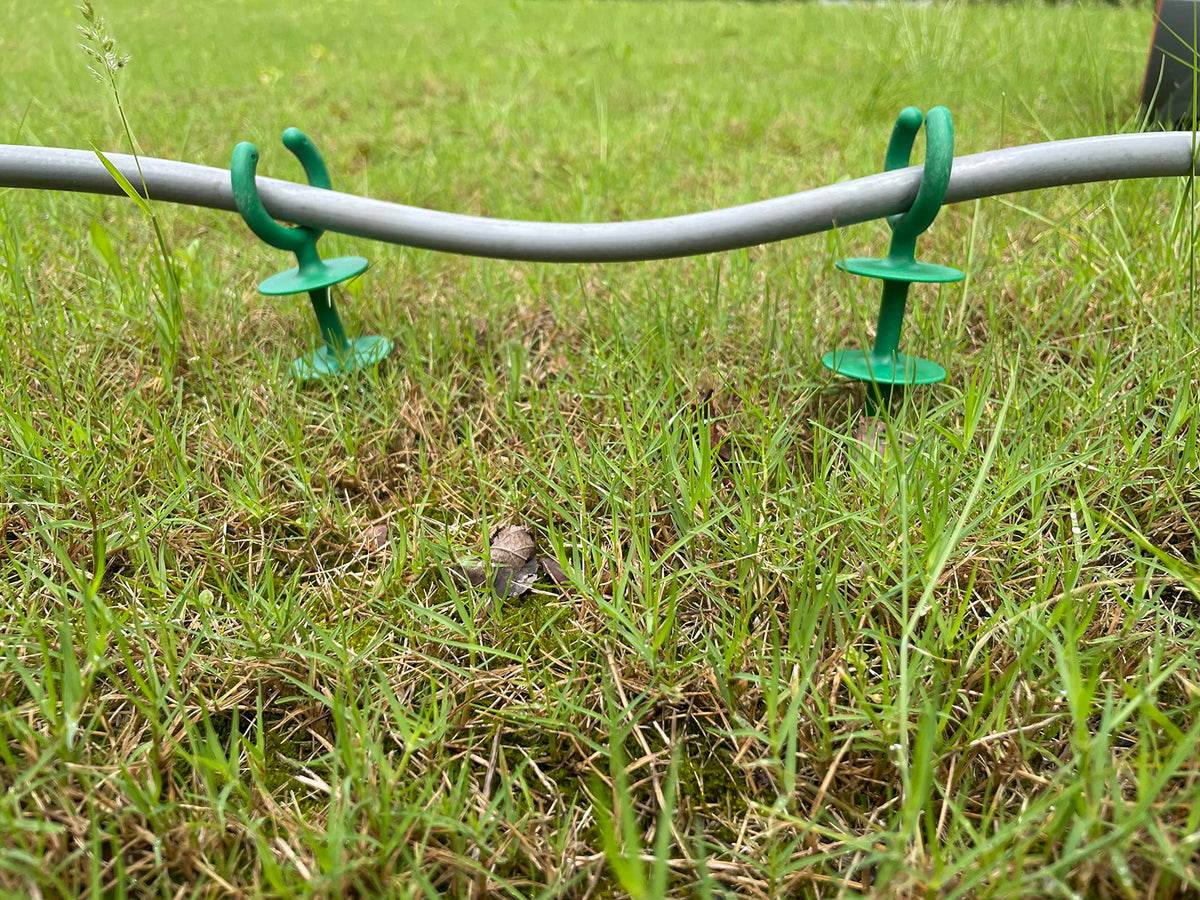 WIBBLESOX durable plastic nails support neat hose routing for tidy yards