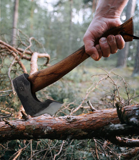 WICING camp axe used for wood splitting in a camping scenario