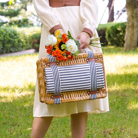 Wickeland picnic blanket inside for comfortable outdoor dining.