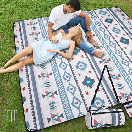 WICKERLAND picnic blanket extra-large waterproof keeps you dry on damp ground.