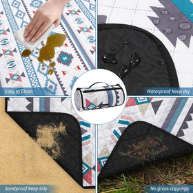 WICKERLAND picnic blanket soft-top offers comfortable seating on grass.