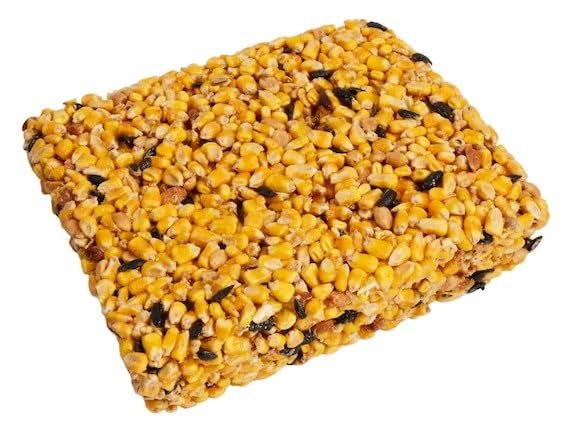 Wildlife Sciences Songbird Treats seed cakes on feeder attract birds and squirrels