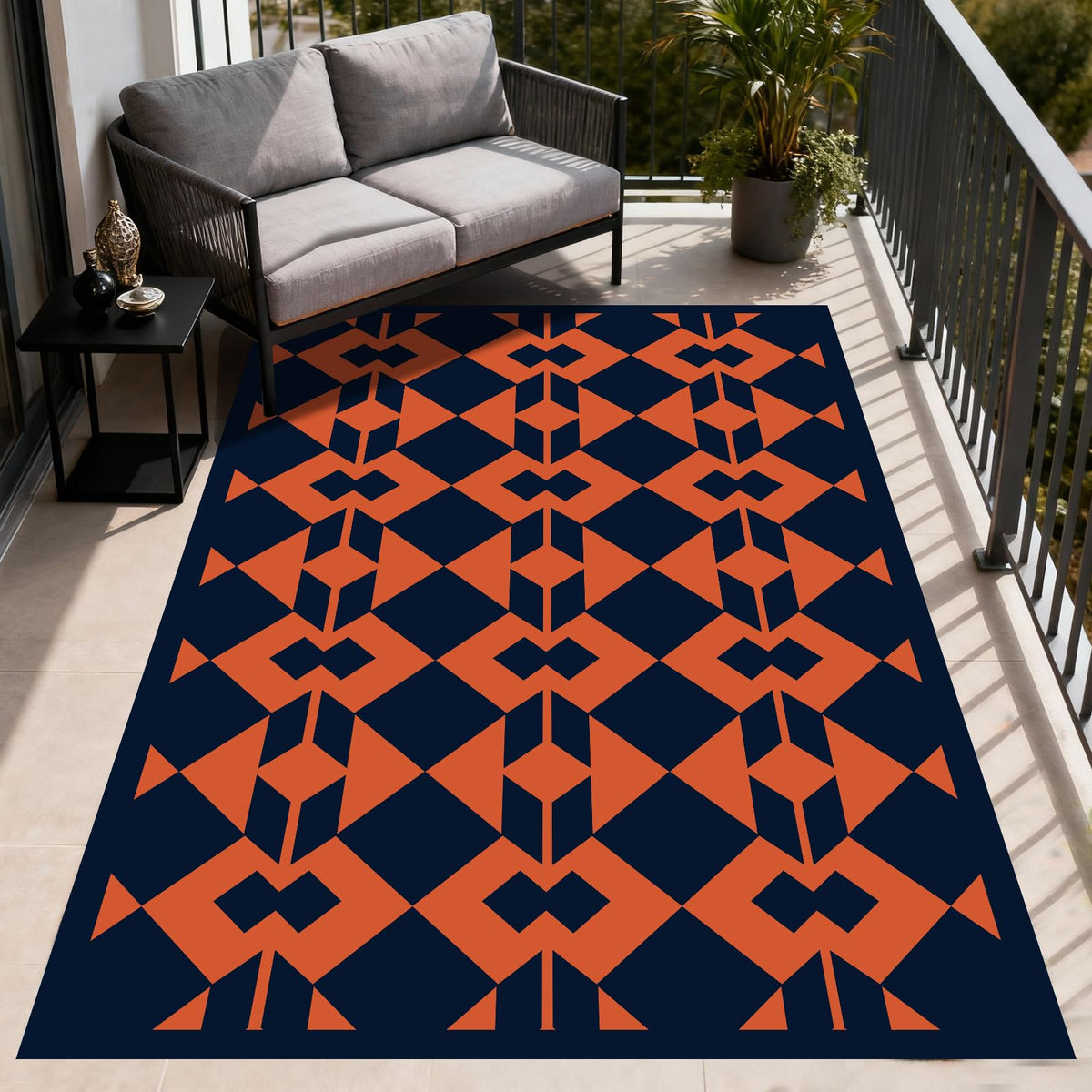 Wildroots quick-dry outdoor rug being hose-cleaned after outdoor use.