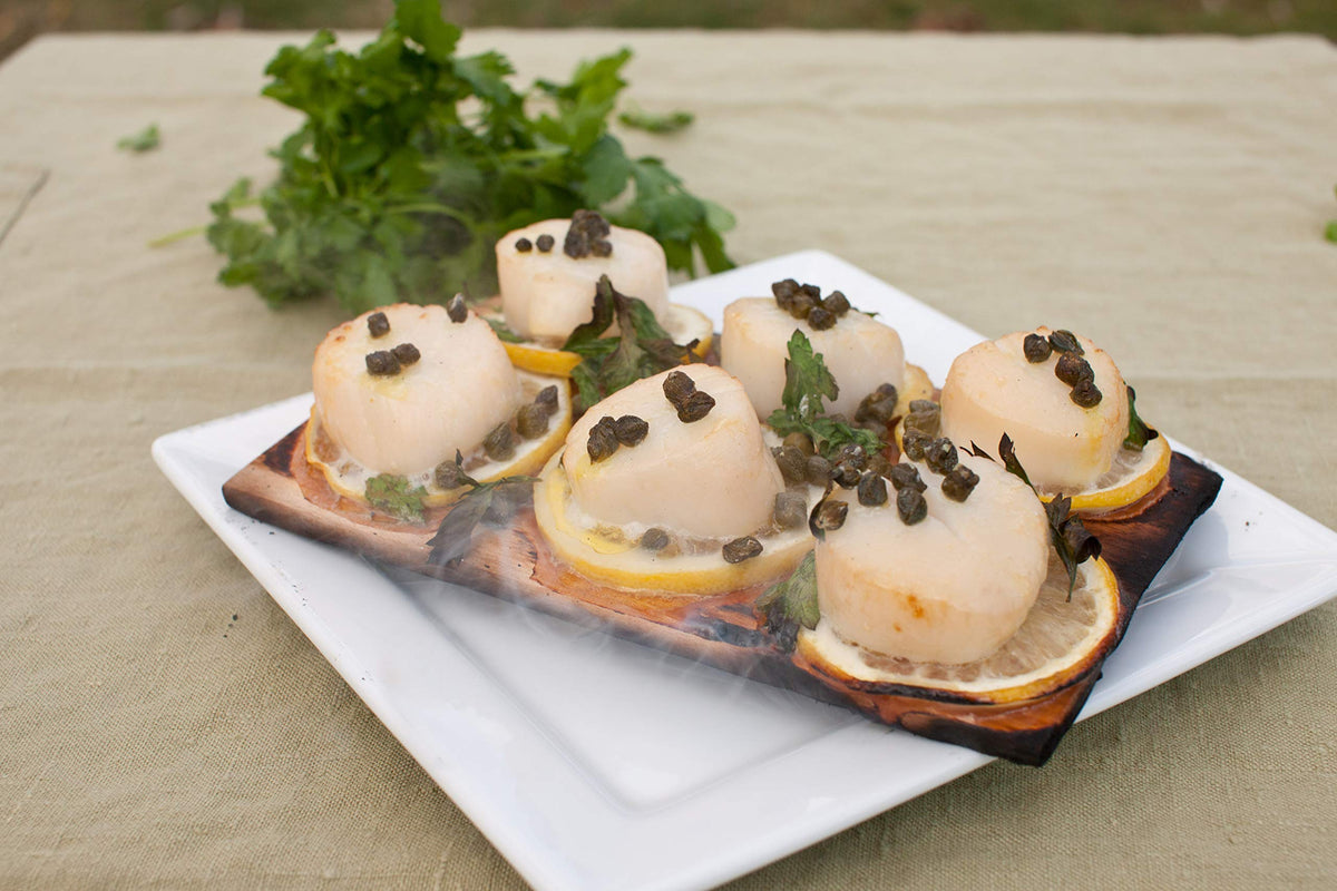 Wildwood Grilling soft cheese on cedar plank preserves rind texture