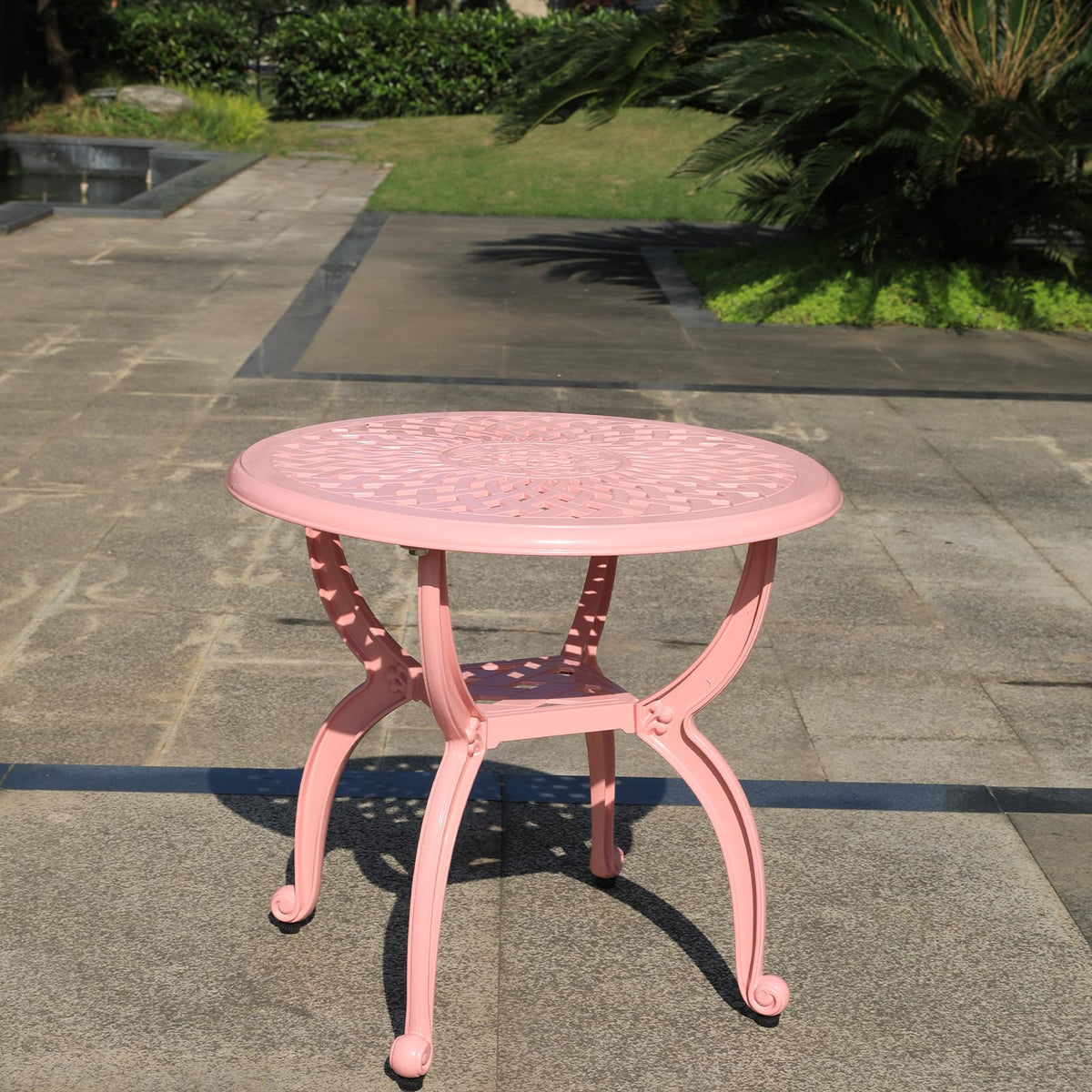 WILOUNGE elegant pink round table complements porches and balconies with subtle charm.