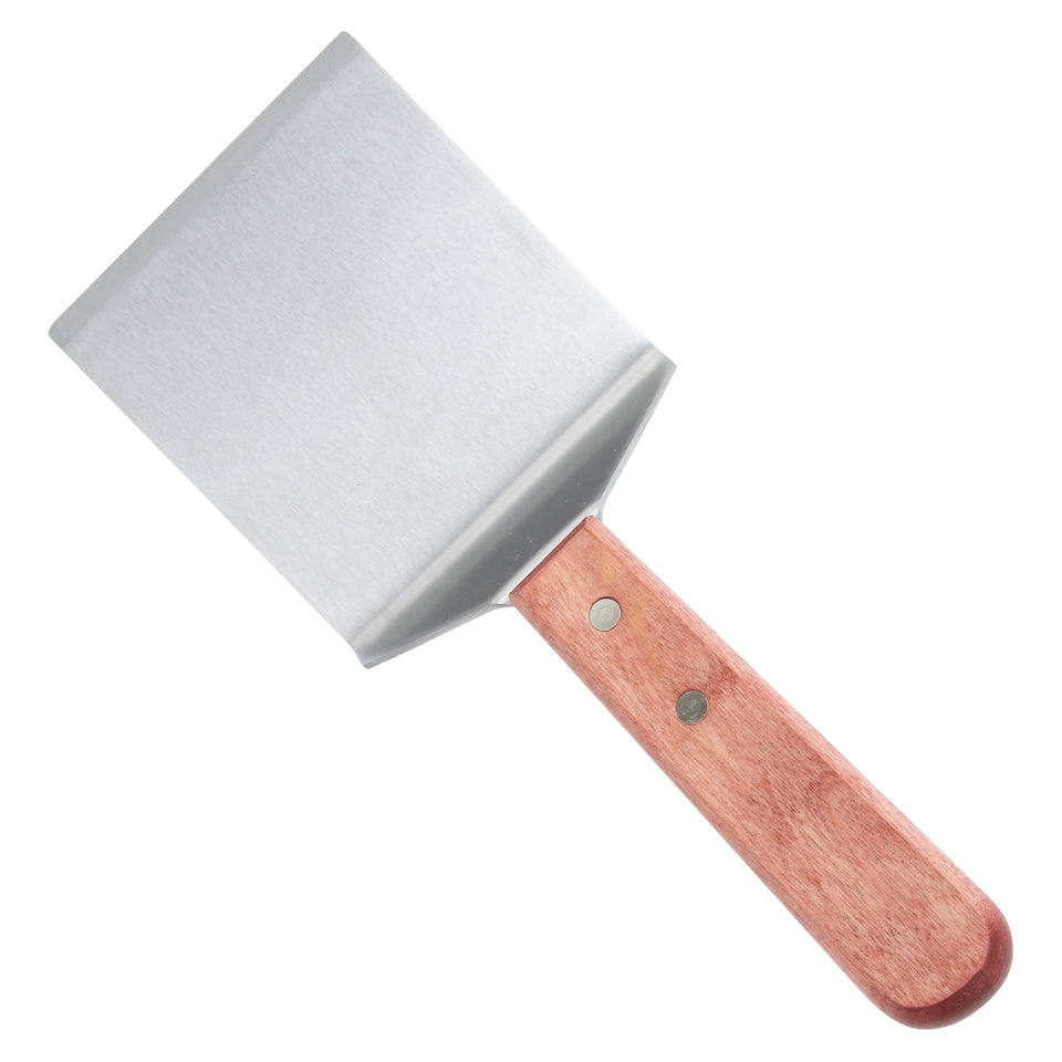 Winco TN46 rigid blade turner for steaks and burgers on griddles, ideal for precise flips.