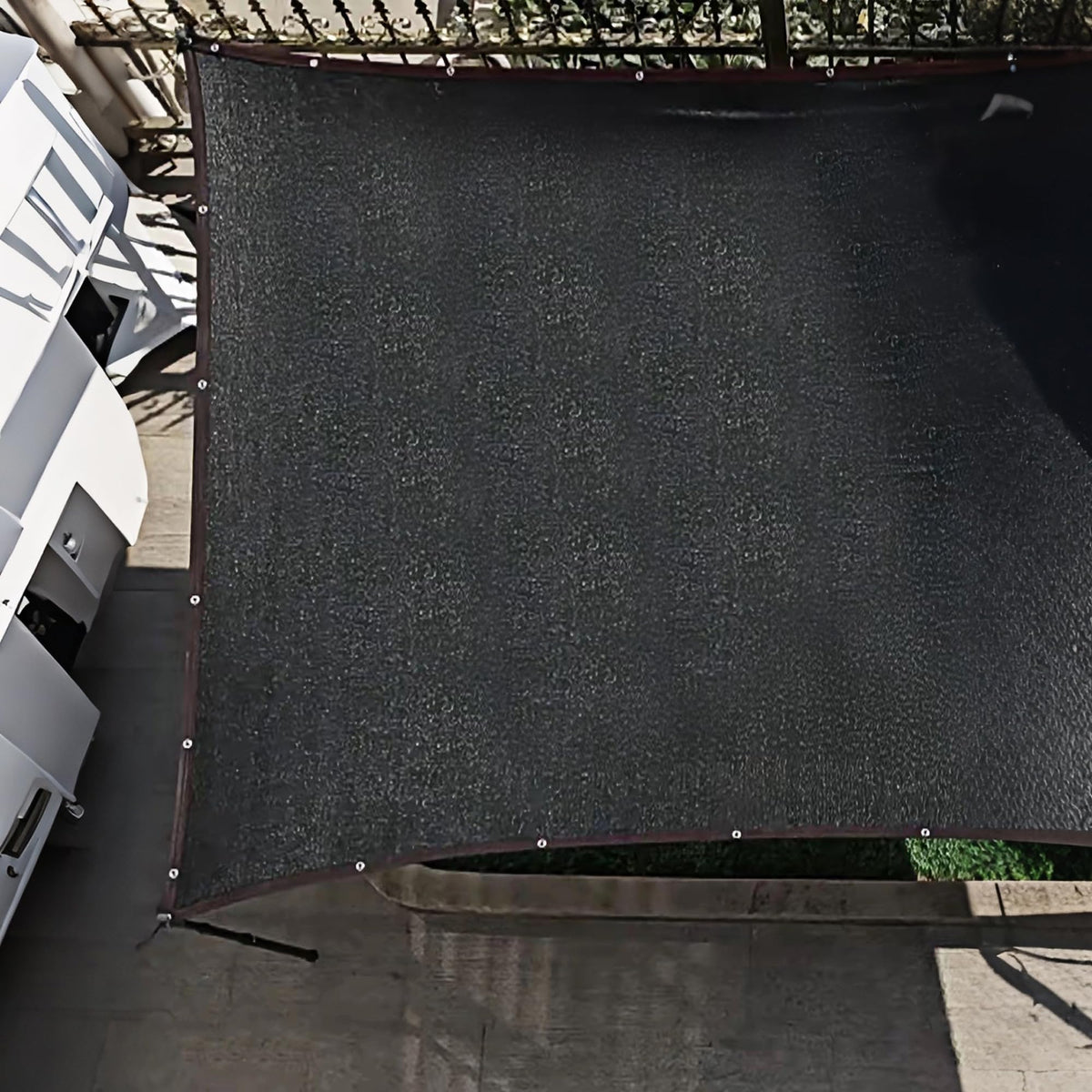 Winemana outdoor shade netting protects vehicles and gear from sun.