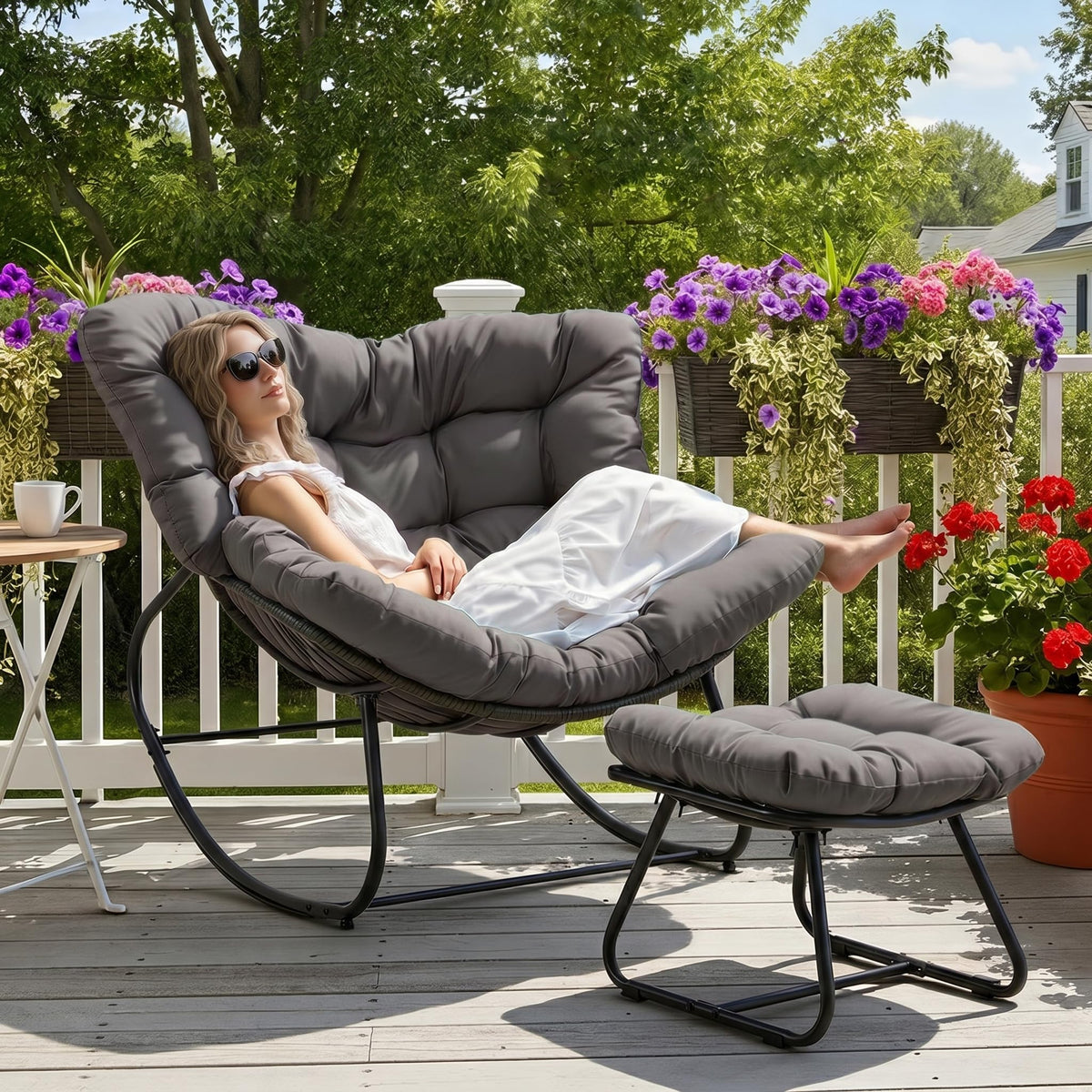 Wisteria Lane patio rocking chair with ottoman for relaxing porch evenings.