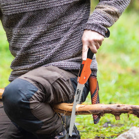 WixiTool folding pruning saw stored in a compact case for safe transport.