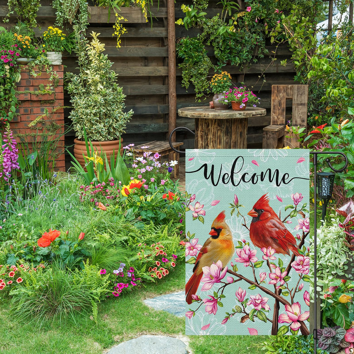 Wodison burlap spring flag with floral design adds rustic texture outside.