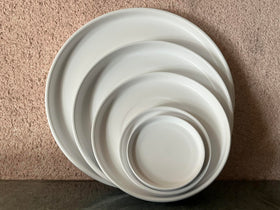 Durable ceramic construction remains stylish longer than plastic trays.