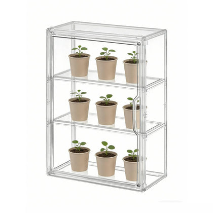 Wollibao mini greenhouse indoors with clear front for easy plant monitoring.