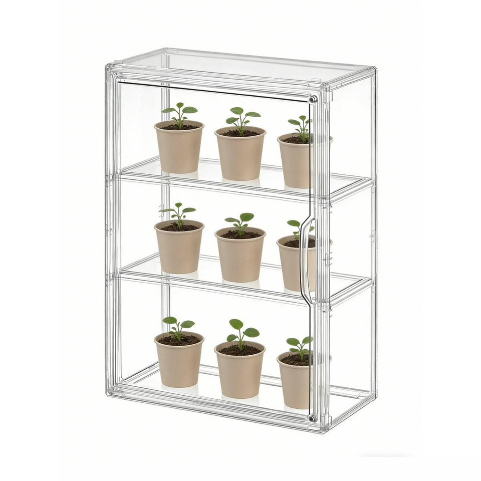 Wollibao mini greenhouse indoors with clear front for easy plant monitoring.