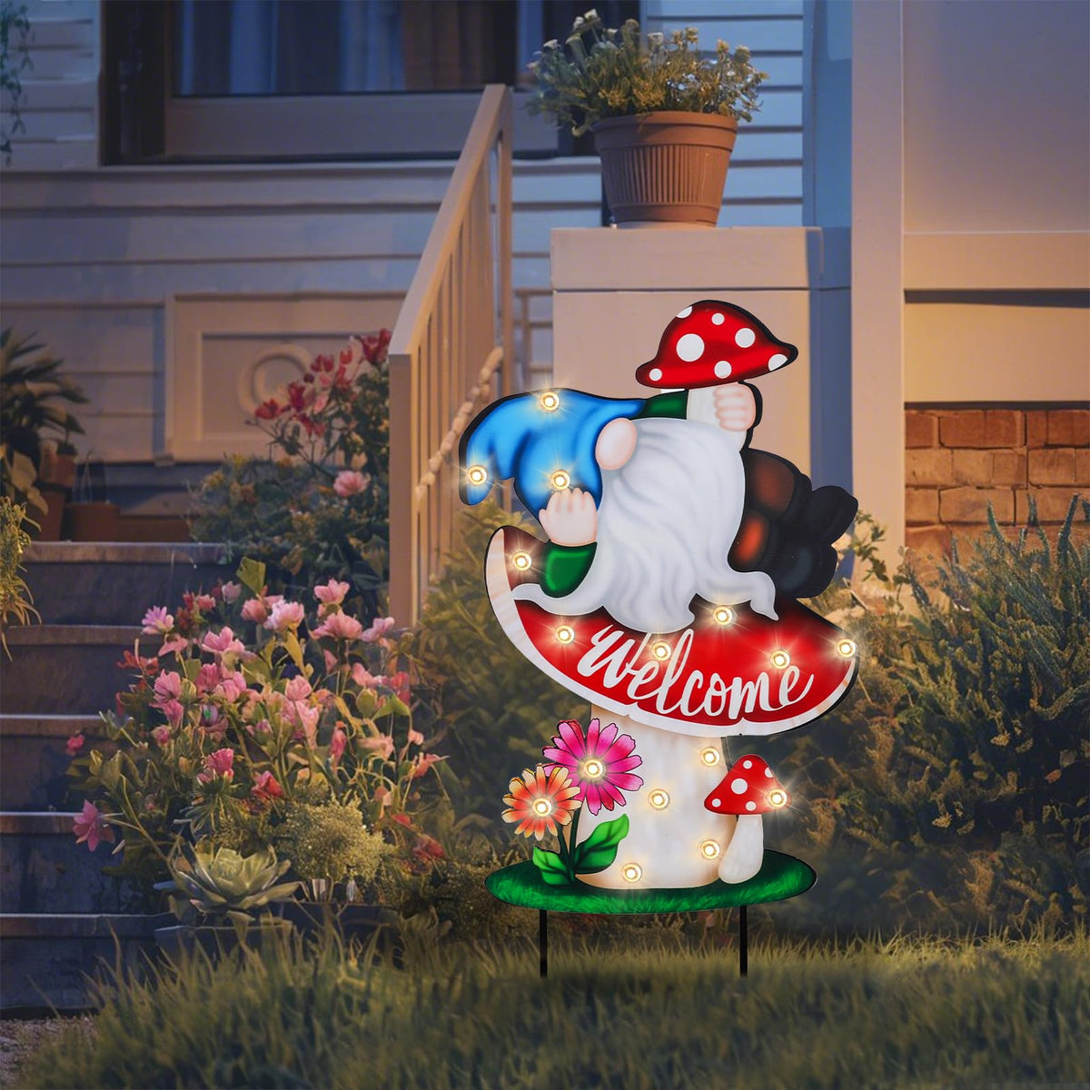 Wonder Garden outdoor sign mushroom lights up the yard at night.